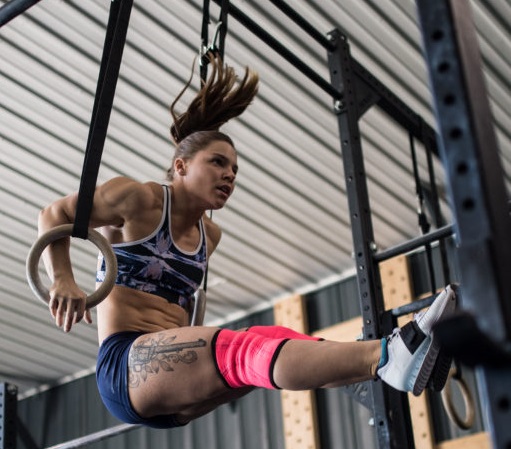 heila Barden performs muscle-ups in preparation for competition in 2017
